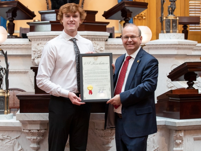 Brenner Honors State Swimming Champion